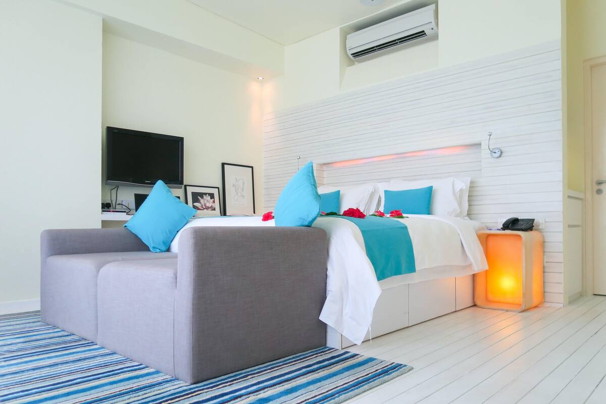 Premium bedding, down duvets, memory-foam beds, minibar