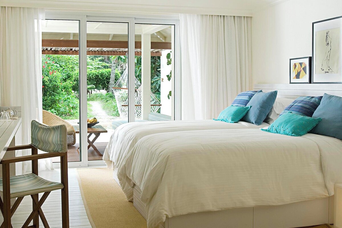 Premium bedding, down comforters, memory foam beds, minibar