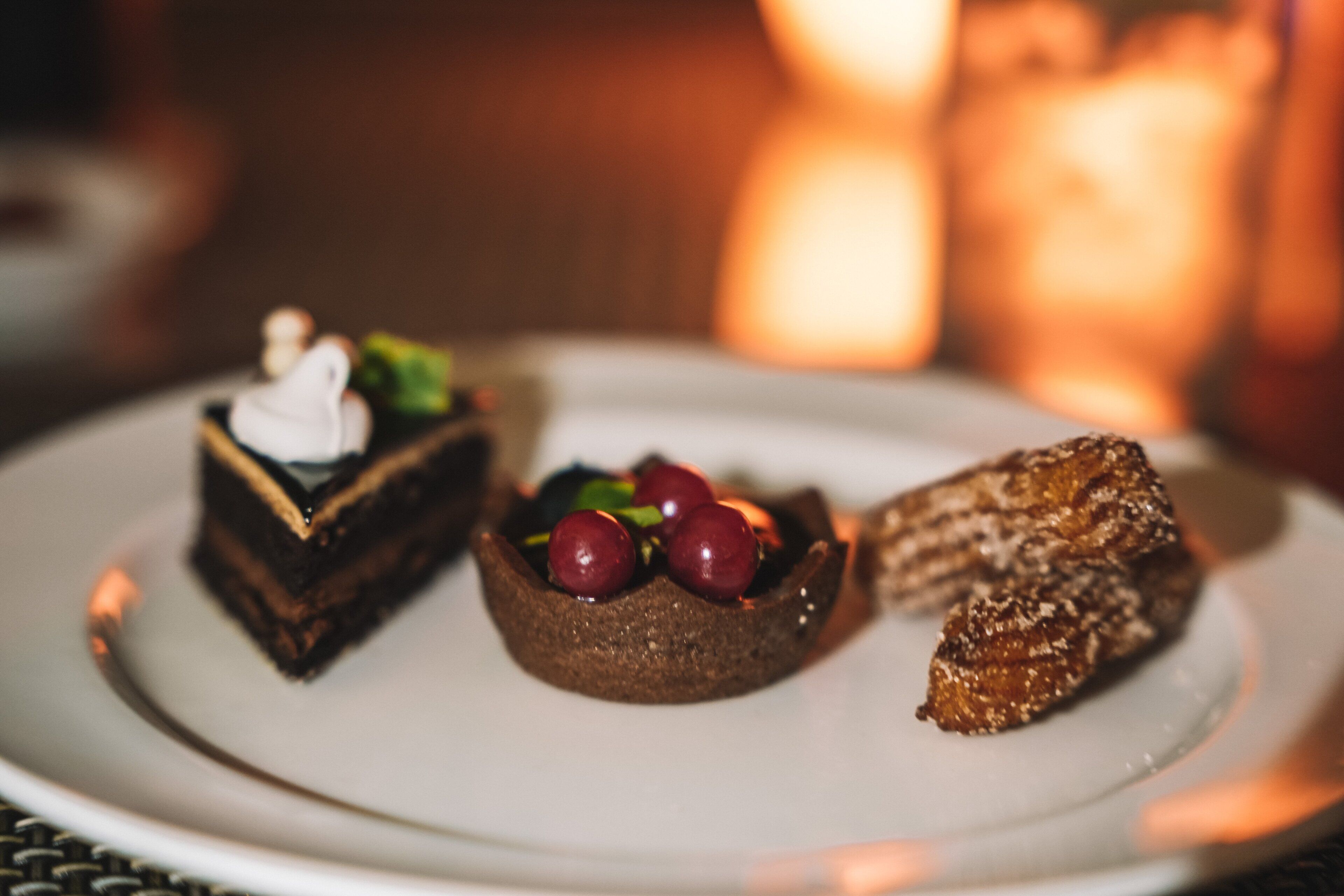 A dessert plate with three different types of desserts.
