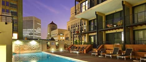 Outdoor pool, pool umbrellas, pool loungers