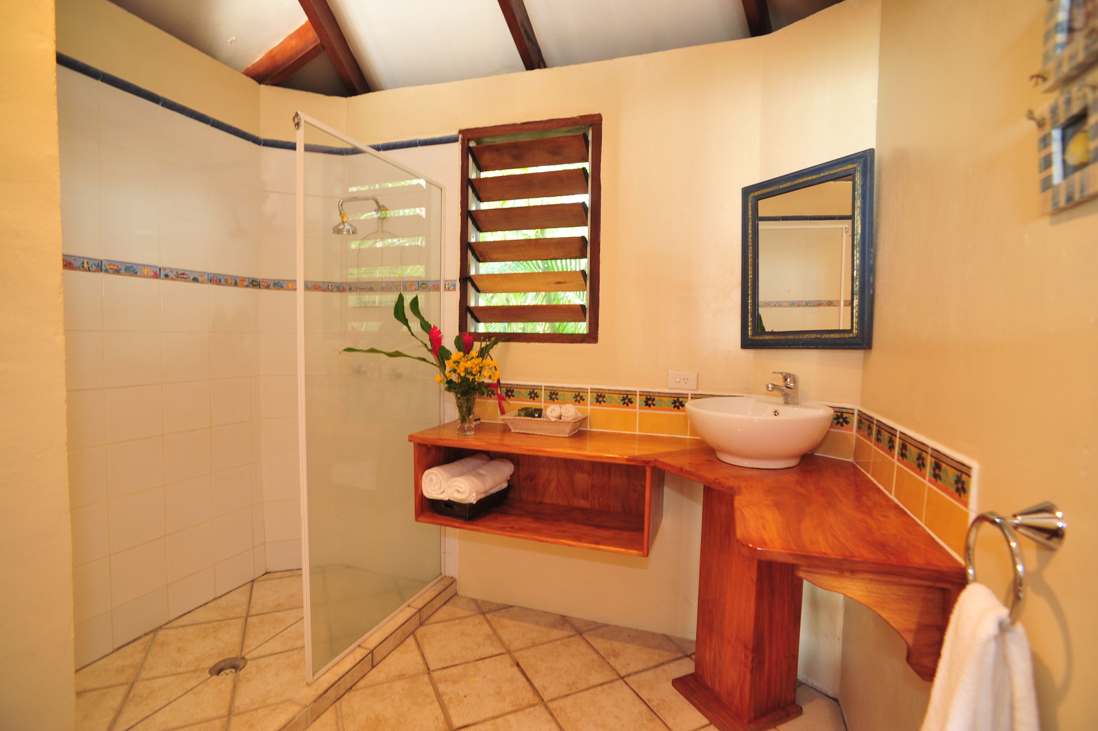 one bedroom oceanside bungalow | bathroom | free toiletries, towels