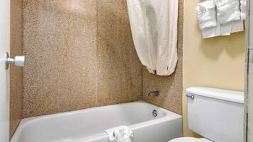 Standard Room, 2 Queen Beds, Non Smoking | Bathroom | Separate tub and shower, hair dryer, towels