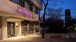 A modern building with a neon sign reading "Moggy" at the entrance. - Moxy Belgrade (Belgrade)