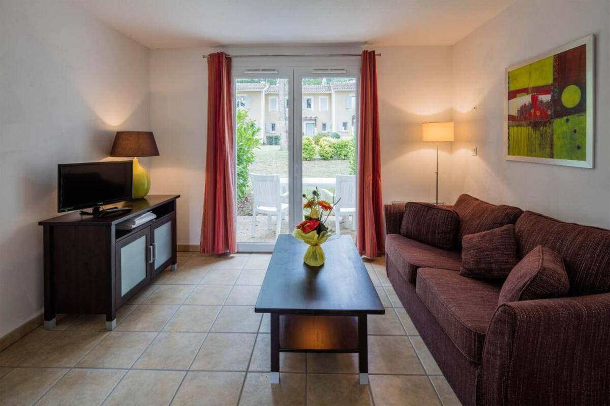 Apartment, 2 Bedrooms | Blackout drapes, free cribs/infant beds, free WiFi, bed sheets