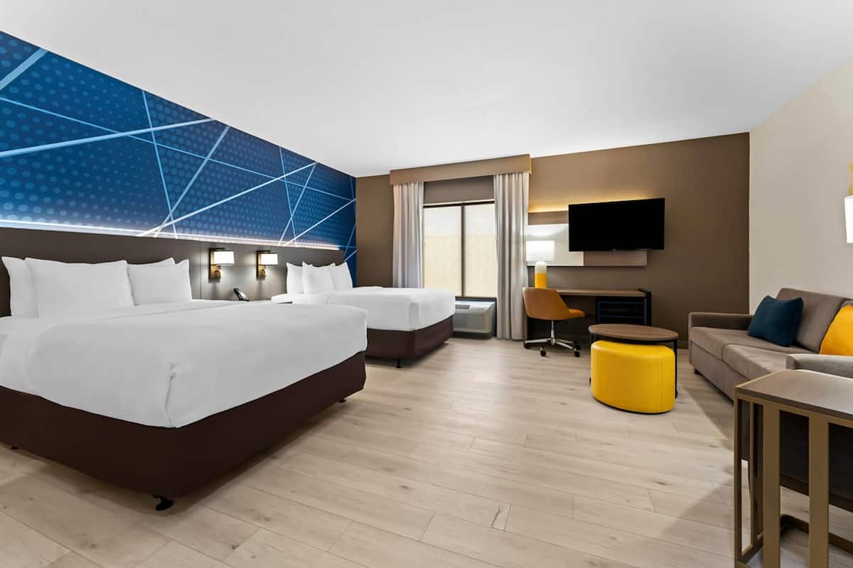 Suite, 2 letti queen, accessibile ai disabili, non fumatori | Tende oscuranti, insonorizzazione, ferro/asse da stiro, Wi-Fi gratuito