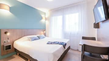 Bureau, rideaux occultants, chambres insonorisées