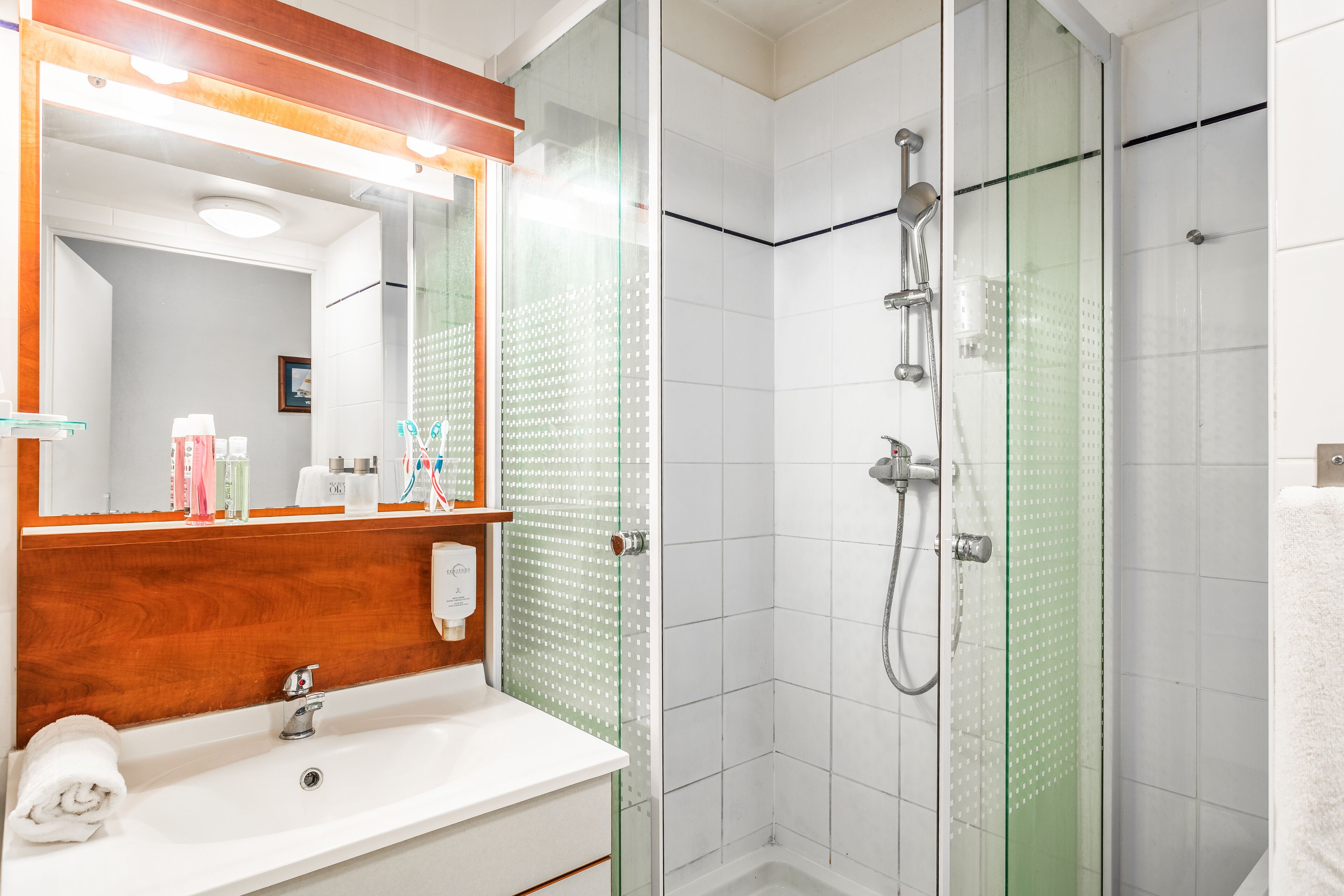 Shower, eco-friendly toiletries, hair dryer, towels