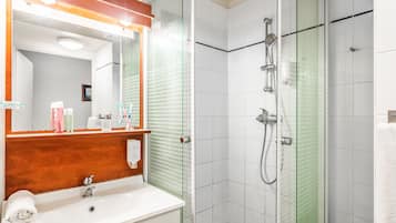 Shower, eco-friendly toiletries, hair dryer, towels