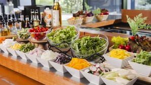 A buffet table with various food items and condiments. - Hotel Gracery Tokyo Tamachi (Tokyo)
