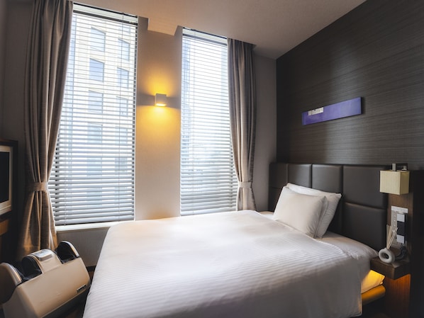 Down comforters, desk, blackout drapes, free WiFi