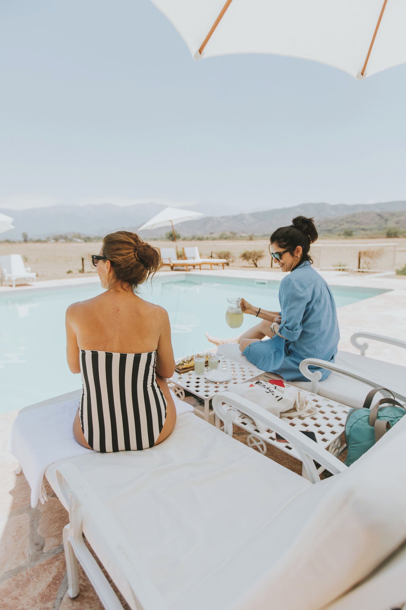 outdoor pool, pool umbrellas, pool loungers