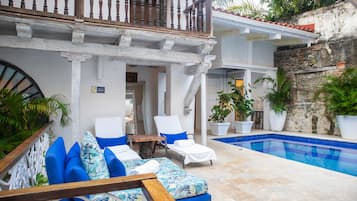 Outdoor pool, pool umbrellas, pool loungers