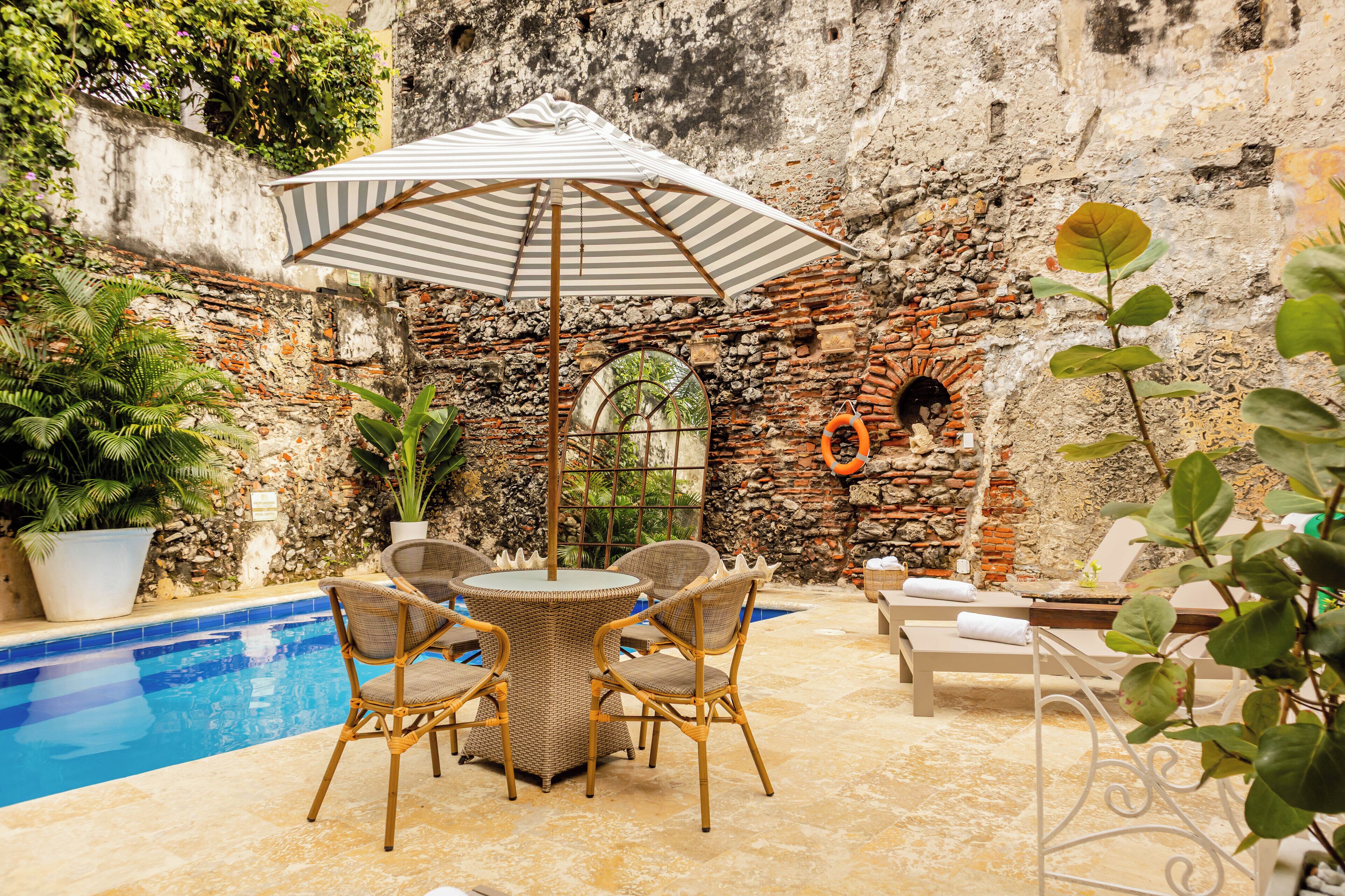 Outdoor pool, pool umbrellas, pool loungers