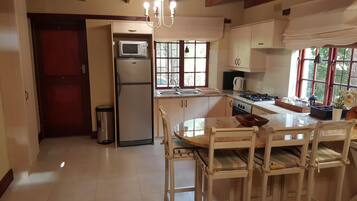 1 Bedroom 1 Bathroom balcony #11 | Private kitchen | Full-sized fridge, microwave, stovetop, cookware/dishes/utensils