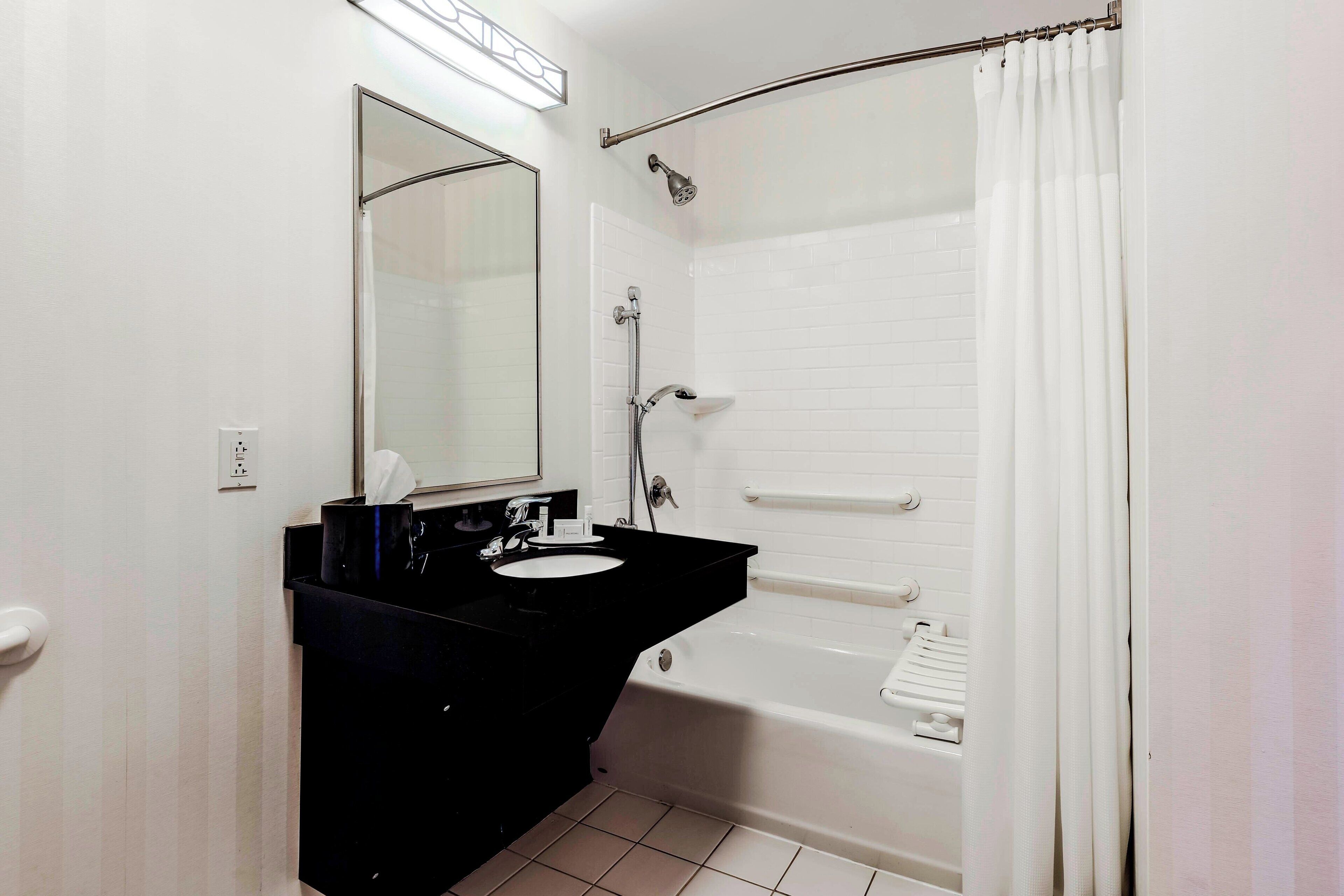 combined shower/bathtub, free toiletries, hair dryer, towels