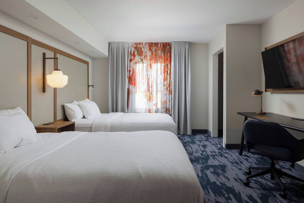 Studio Suite, 2 Double Beds | Desk, blackout drapes, iron/ironing board, free cribs/infant beds