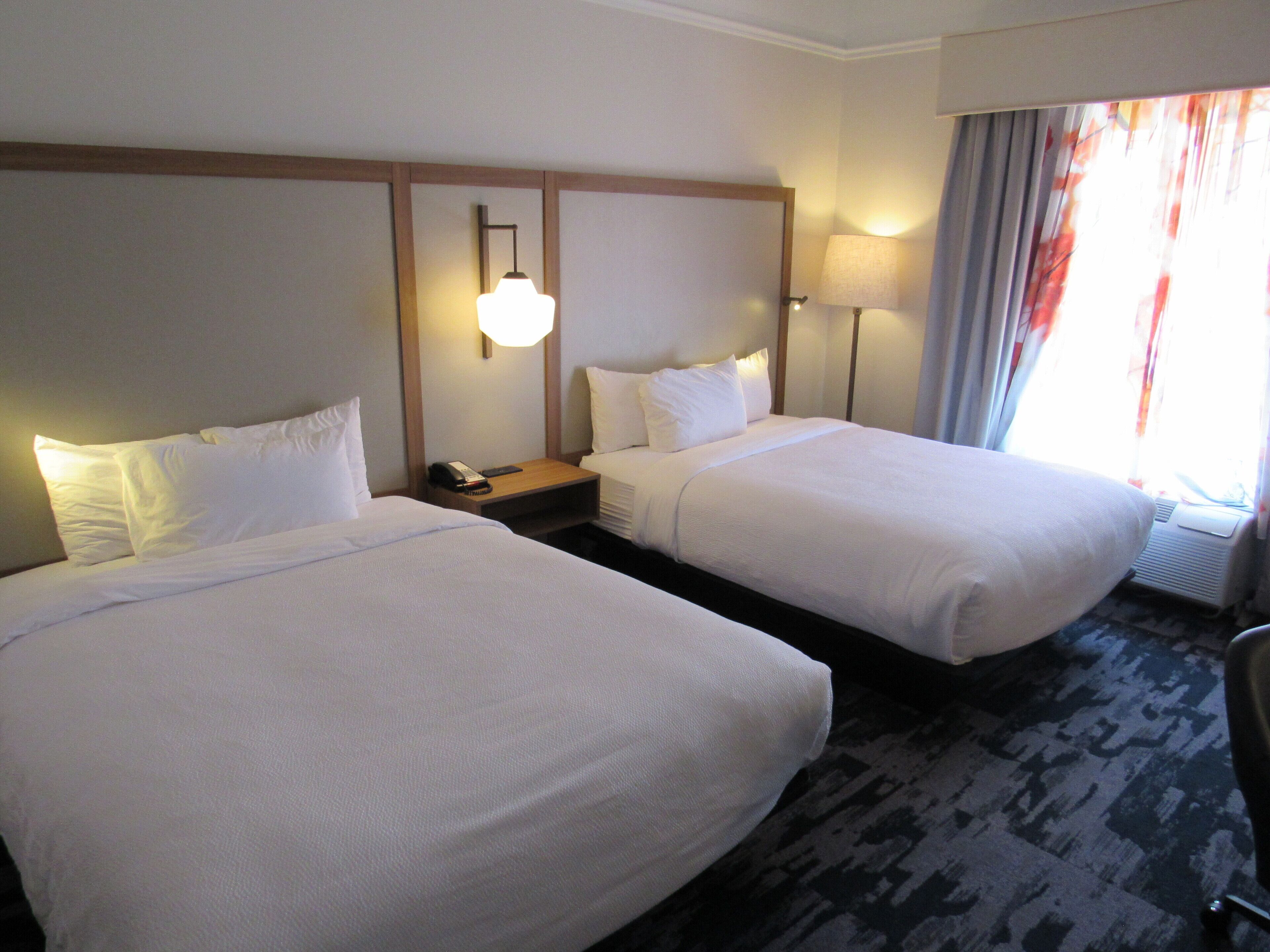 room, 2 queen beds | desk, blackout curtains, iron/ironing board, free cots/infant beds