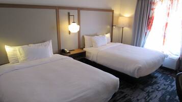 Room, 2 Queen Beds | Desk, blackout drapes, iron/ironing board, free cribs/infant beds