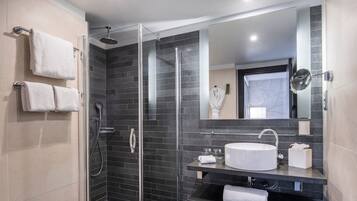 Designer toiletries, hair dryer, bathrobes, slippers