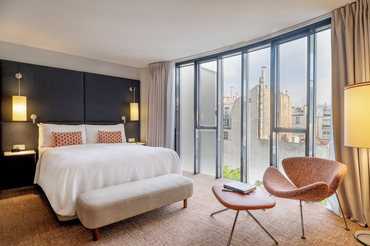 Habitación, 1 cama Queen size, vista al jardín | Ropa de cama de alta calidad y minibar