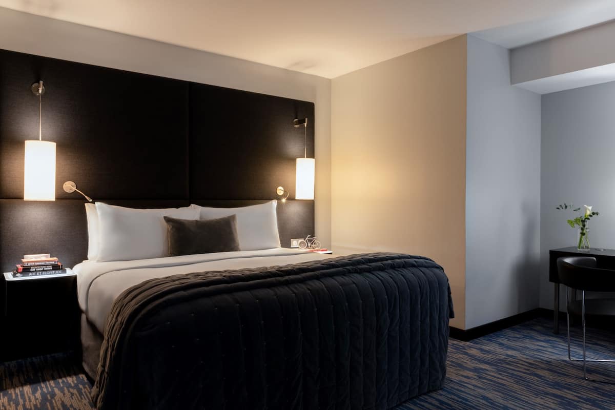 Suite, 1 Bedroom, Garden View (Home Suite Home) | Premium bedding, minibar, in-room safe, blackout drapes