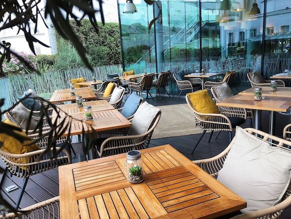 Breakfast, lunch, dinner served; Mediterranean cuisine, garden views