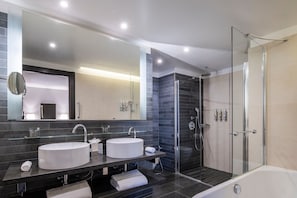 Suite, 1 Bedroom, Garden View (Home Suite Home) | Bathroom | Designer toiletries, hair dryer, bathrobes, slippers