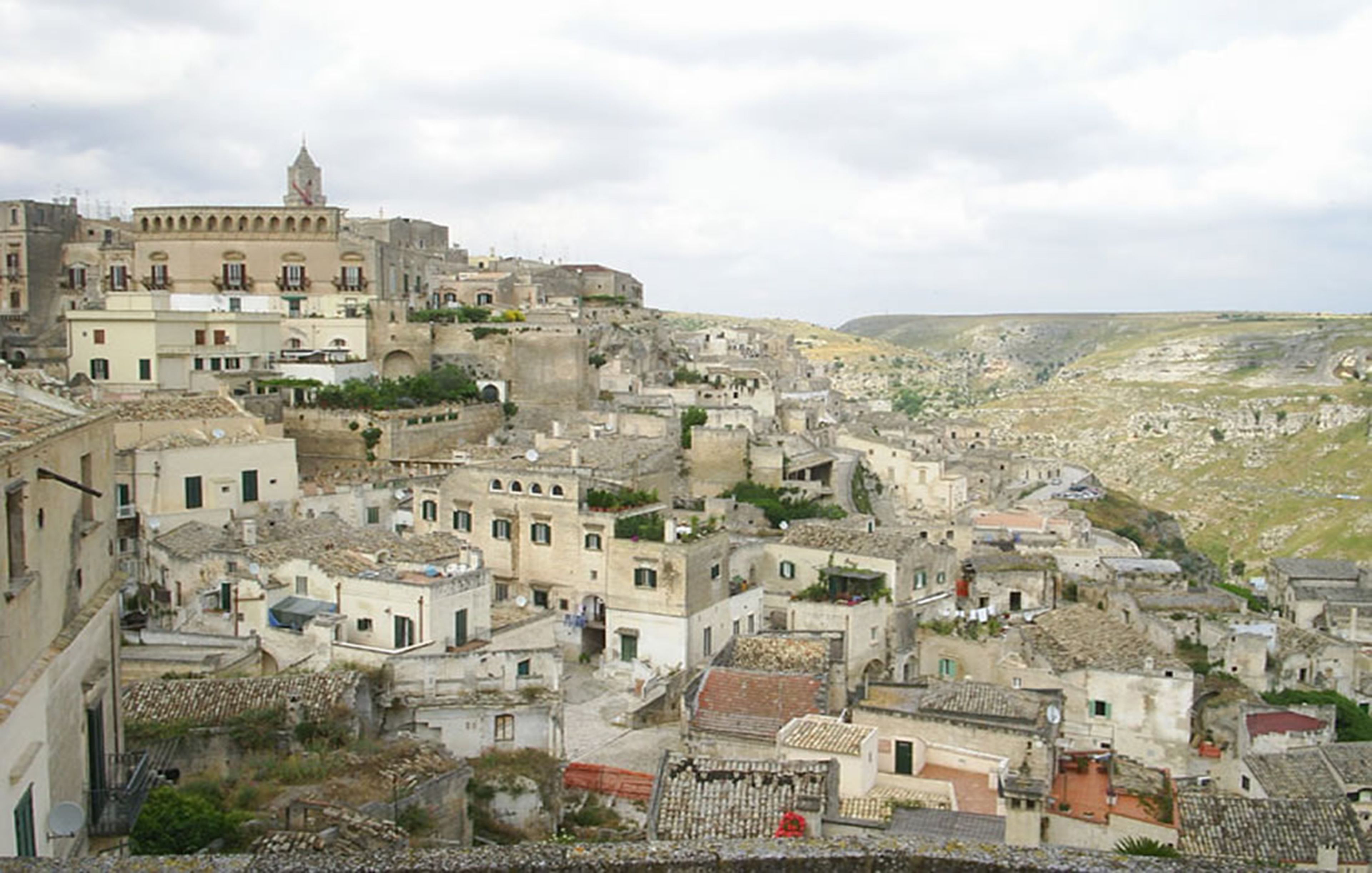 A densely packed historic town with narrow streets and traditional architecture.