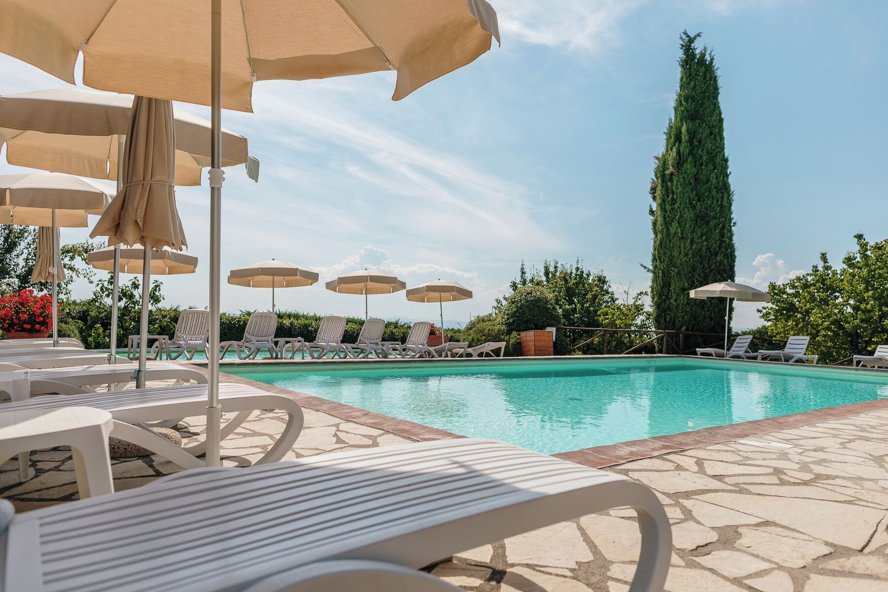 Indoor pool, seasonal outdoor pool, pool umbrellas, sun loungers