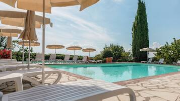 Indoor pool, seasonal outdoor pool, pool umbrellas, sun loungers