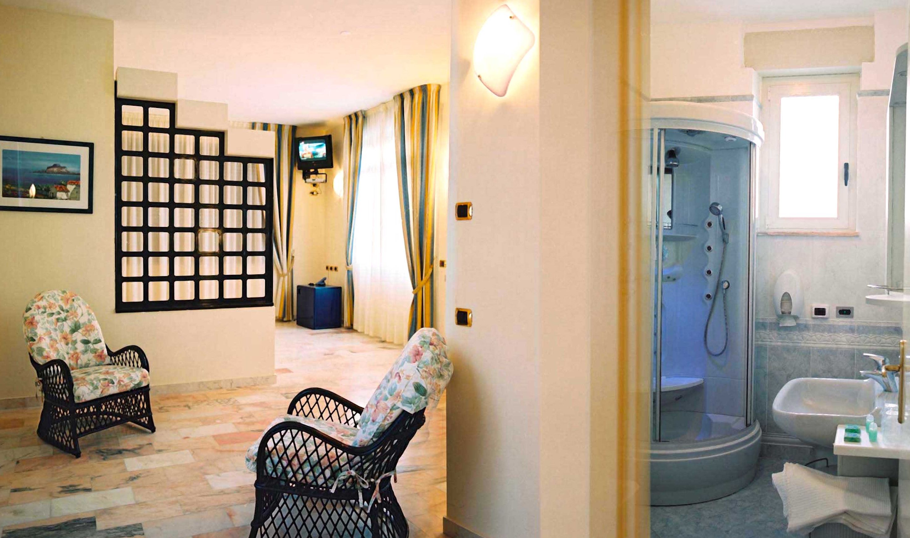 suite, balcony, garden view | living area | 32-inch led tv with satellite channels, tv, pay films