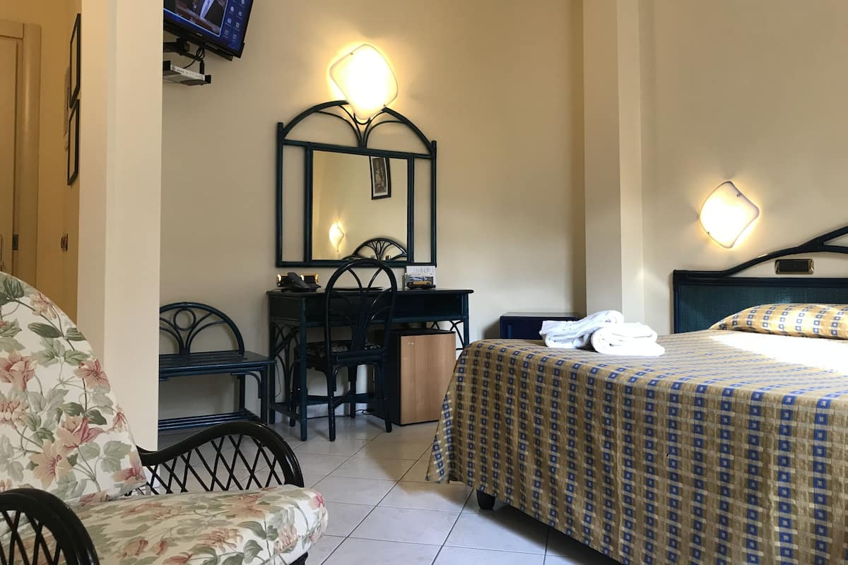 Superior Room, Garden View | 1 bedroom, premium bedding, minibar, in-room safe