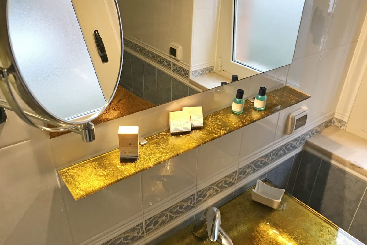 superior room, balcony, partial ocean view | bathroom | shower, rainfall showerhead, free toiletries, hair dryer