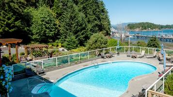 Outdoor pool, open 10:00 AM to 9:00 PM, pool loungers