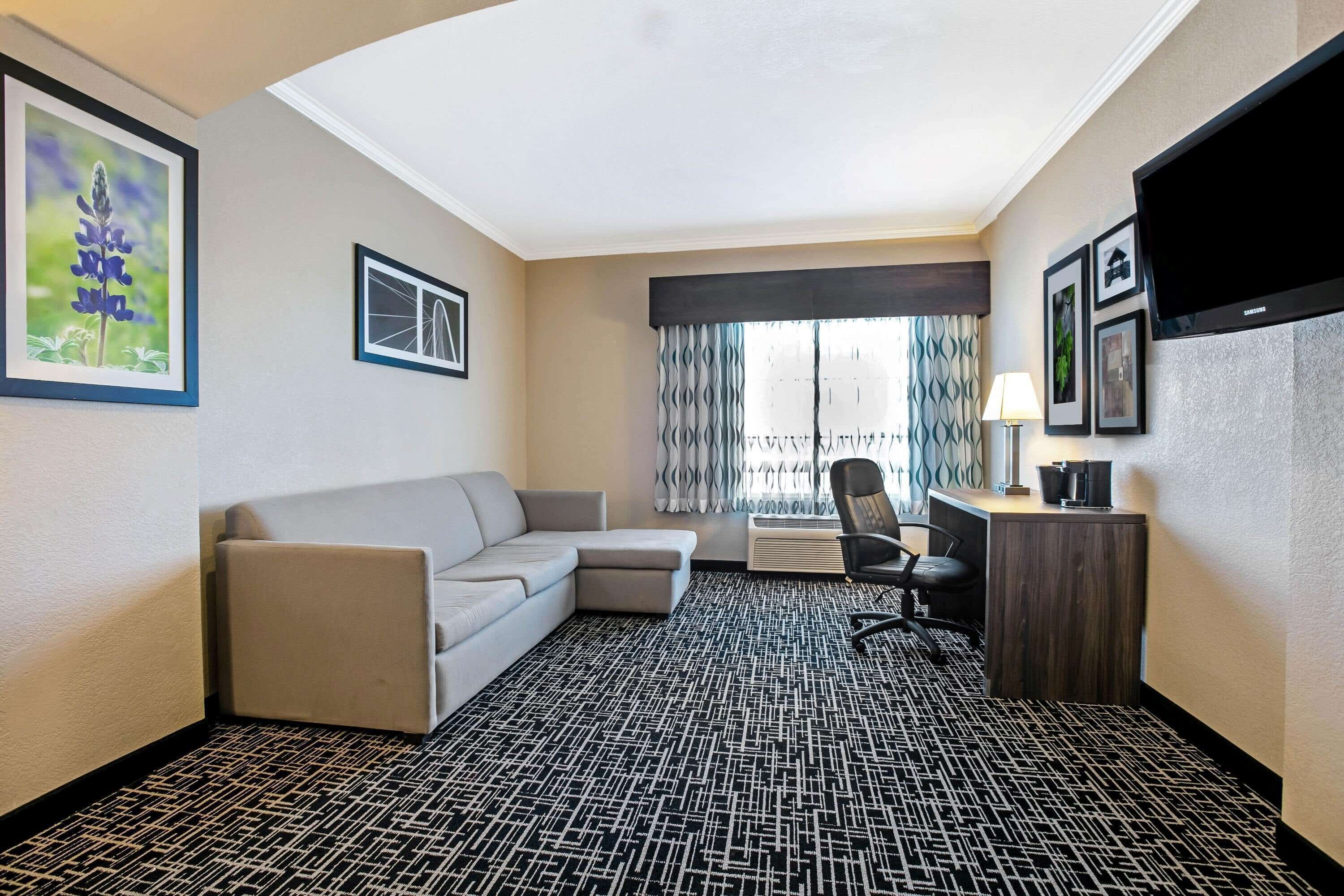 premium bedding, desk, laptop workspace, blackout curtains