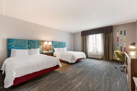 Desk, blackout drapes, iron/ironing board, free cribs/infant beds