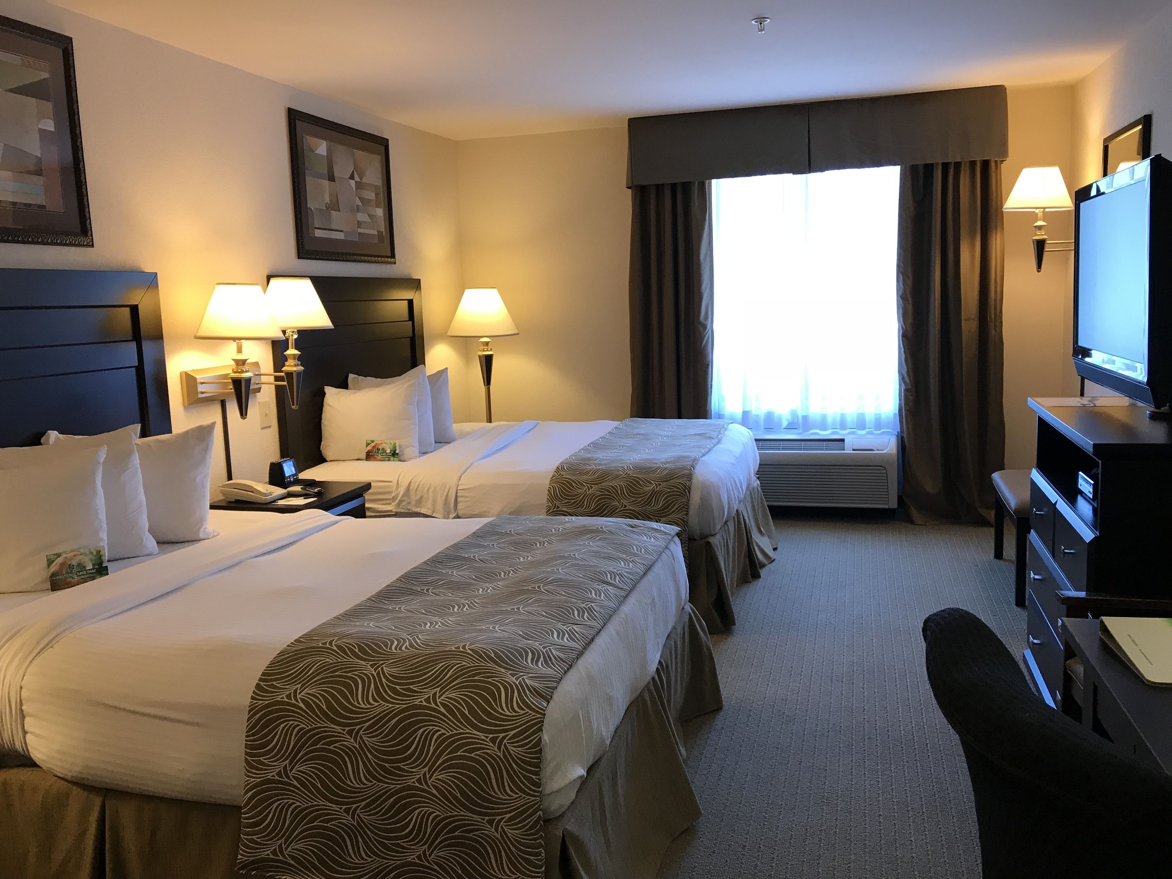 standard room, 2 queen beds, non smoking | premium bedding, in-room safe, desk, laptop workspace