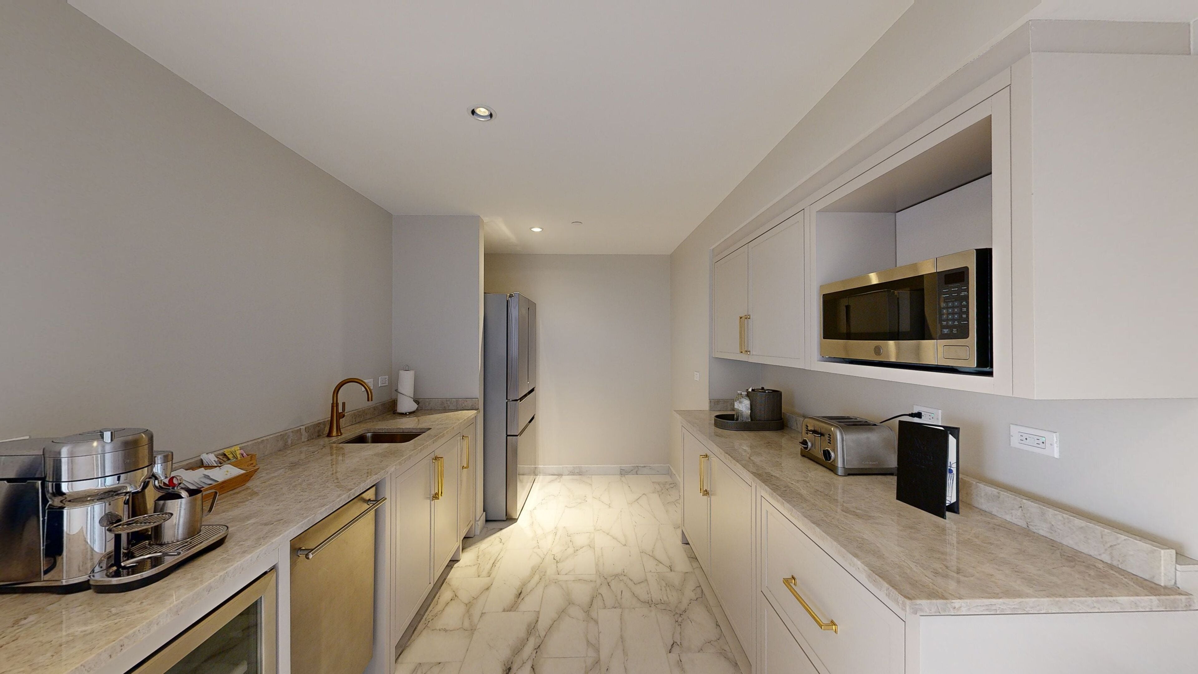 presidential suite, 1 king bed | private kitchen | mini-fridge, coffee/tea maker