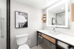 Combined shower/tub, hair dryer, towels, soap
