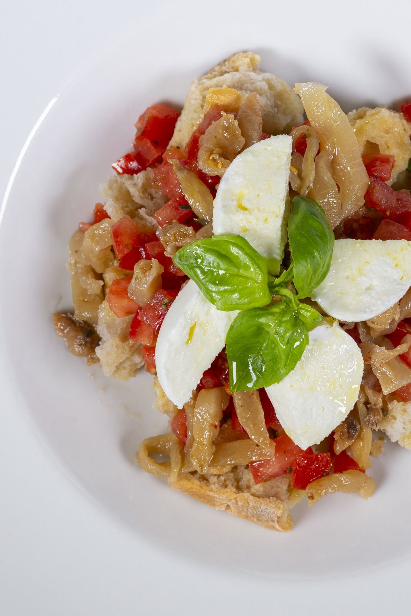 A plate of food with a white background.