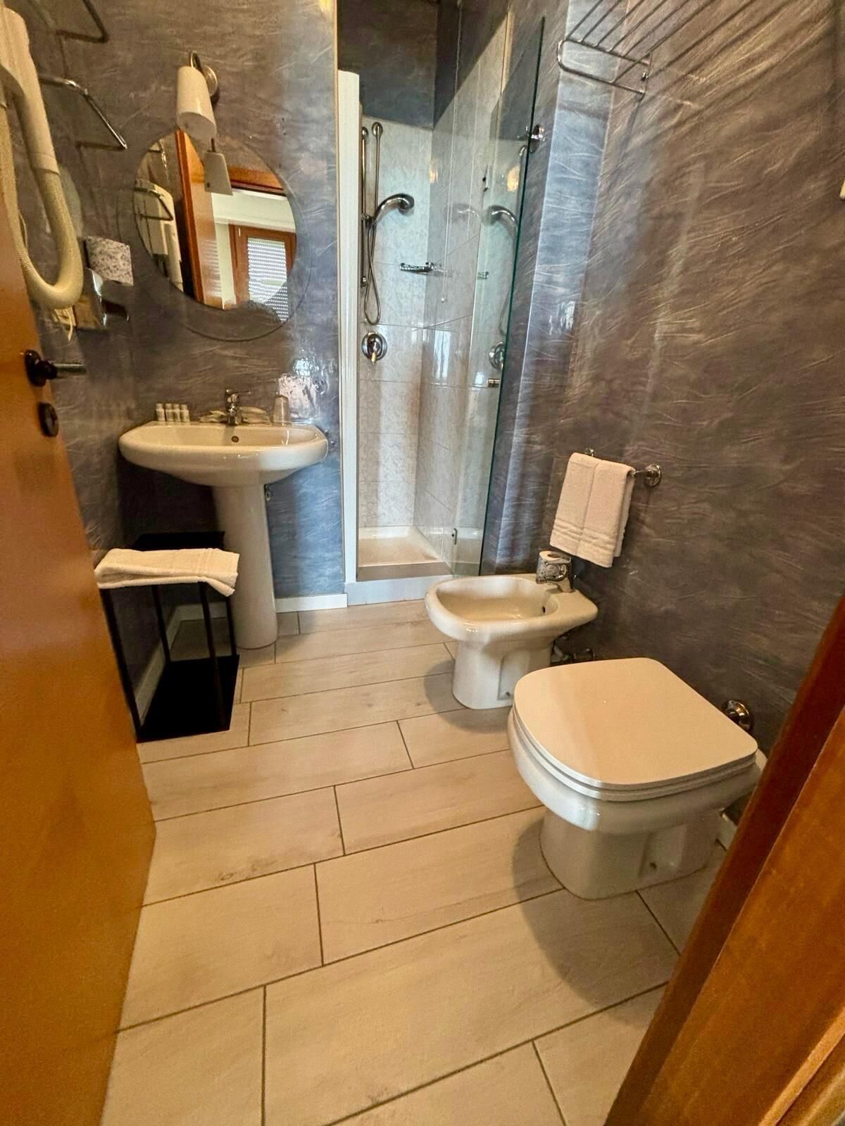 double or twin room, sea view | bathroom | shower, free toiletries, hair dryer, towels