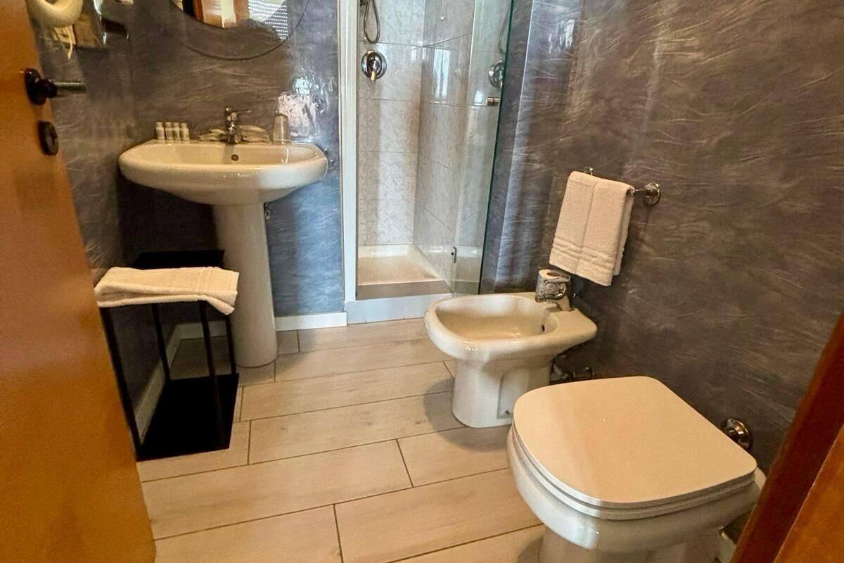 double or twin room, sea view | bathroom | shower, free toiletries, hair dryer, towels