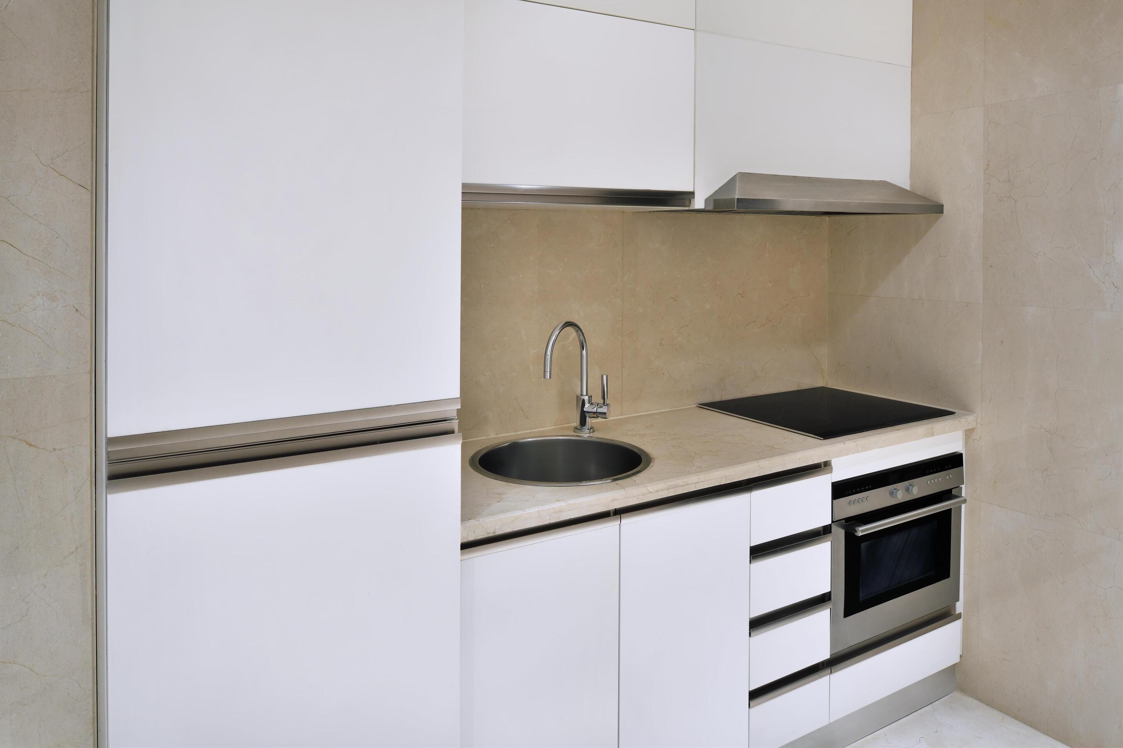 presidential suite, multiple beds, city view (presidential suite) | private kitchen | coffee/tea maker, eco-friendly cleaning products