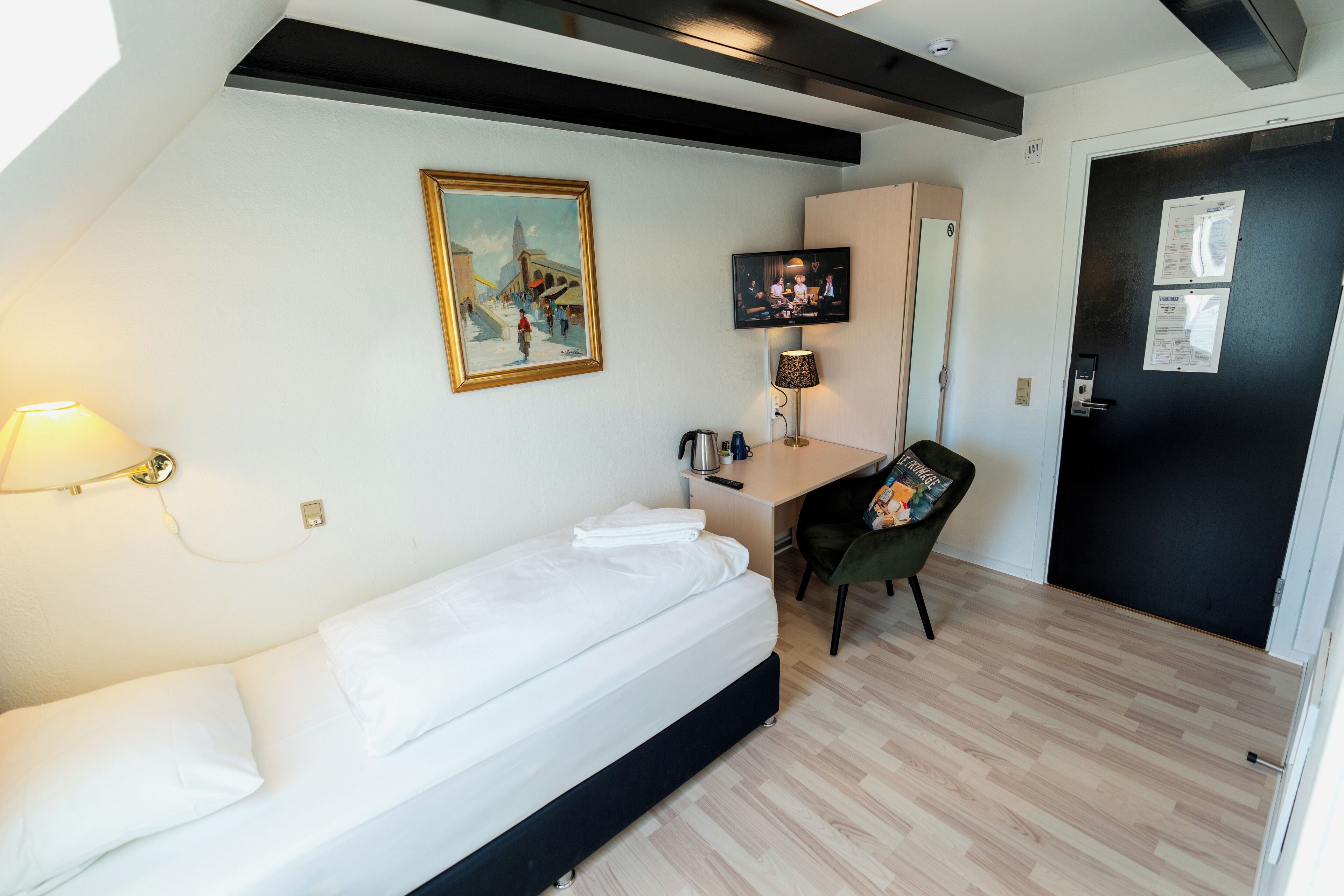 economy single room, small bathroom, note stairs to floor | 1 bedroom, premium bedding, down duvets, desk