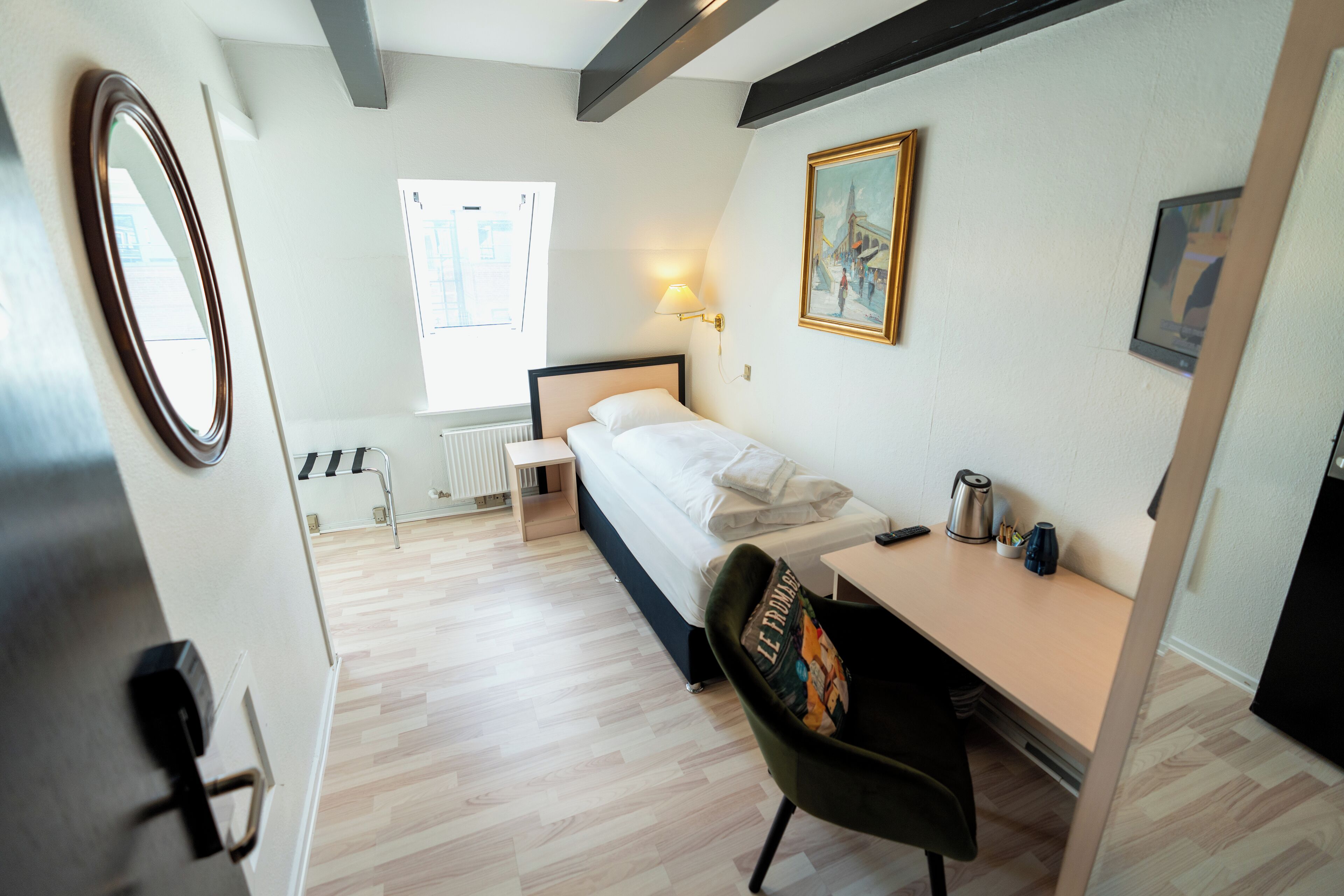 economy single room, small bathroom, note stairs to floor | 1 bedroom, premium bedding, down duvets, desk