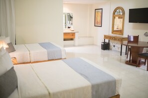 Premium bedding, desk, laptop workspace, blackout curtains