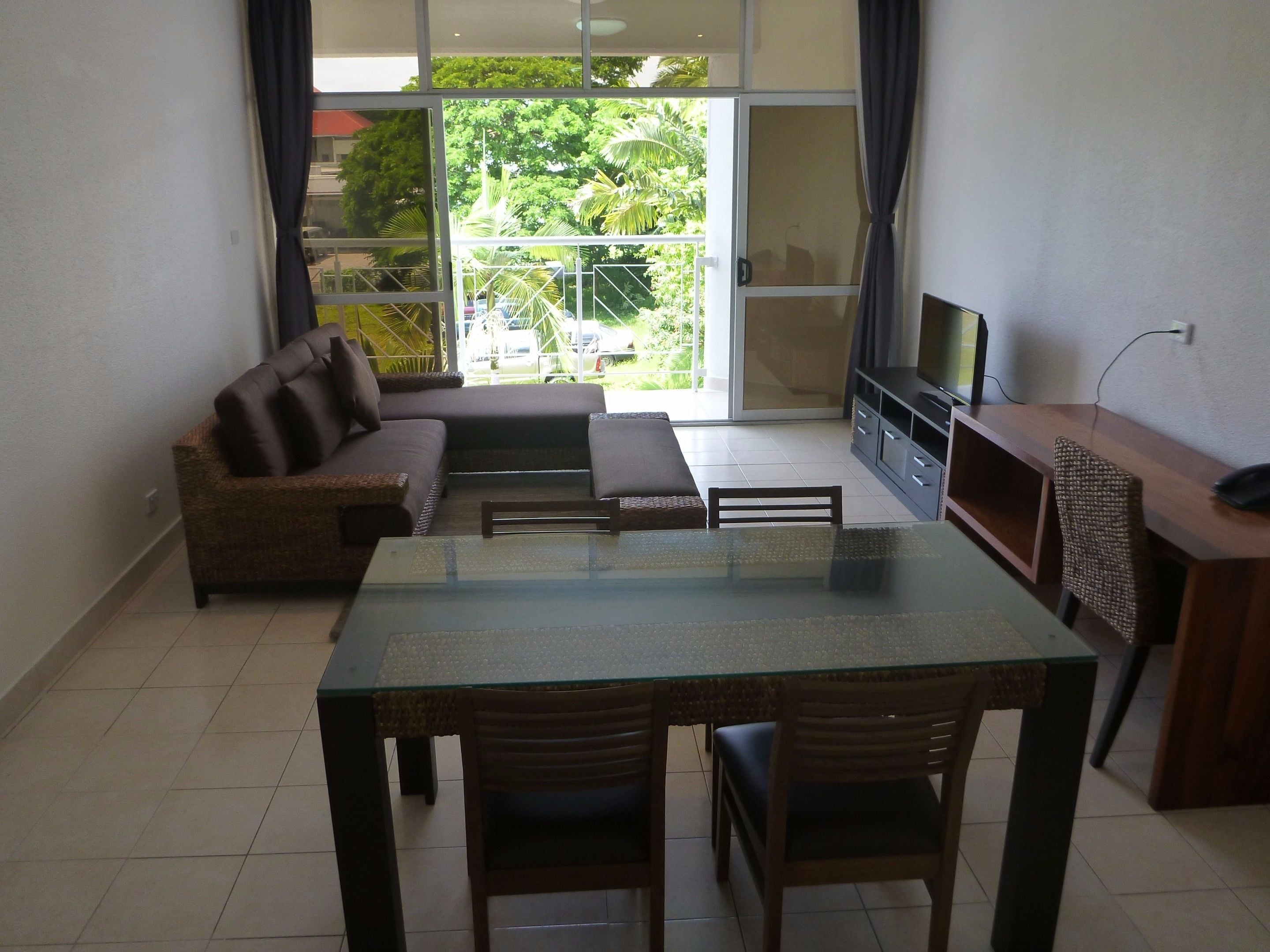 1 bedroom bougainvillea apartment | living area | 26-inch lcd tv with cable channels, tv