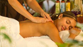 Experience a rejuvenating massage on a comfortable massage table.