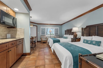 Hypo-allergenic bedding, in-room safe, desk, iron/ironing board at Vanderbilt Beach Resort