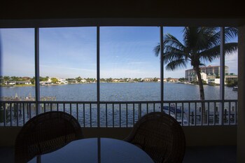 Hotel room view looking out at Vanderbilt Beach Resort